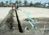 Athletic field drainage trench